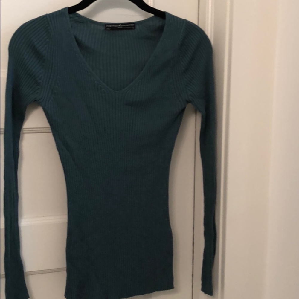 Ribbed, v-neck silk sweater.